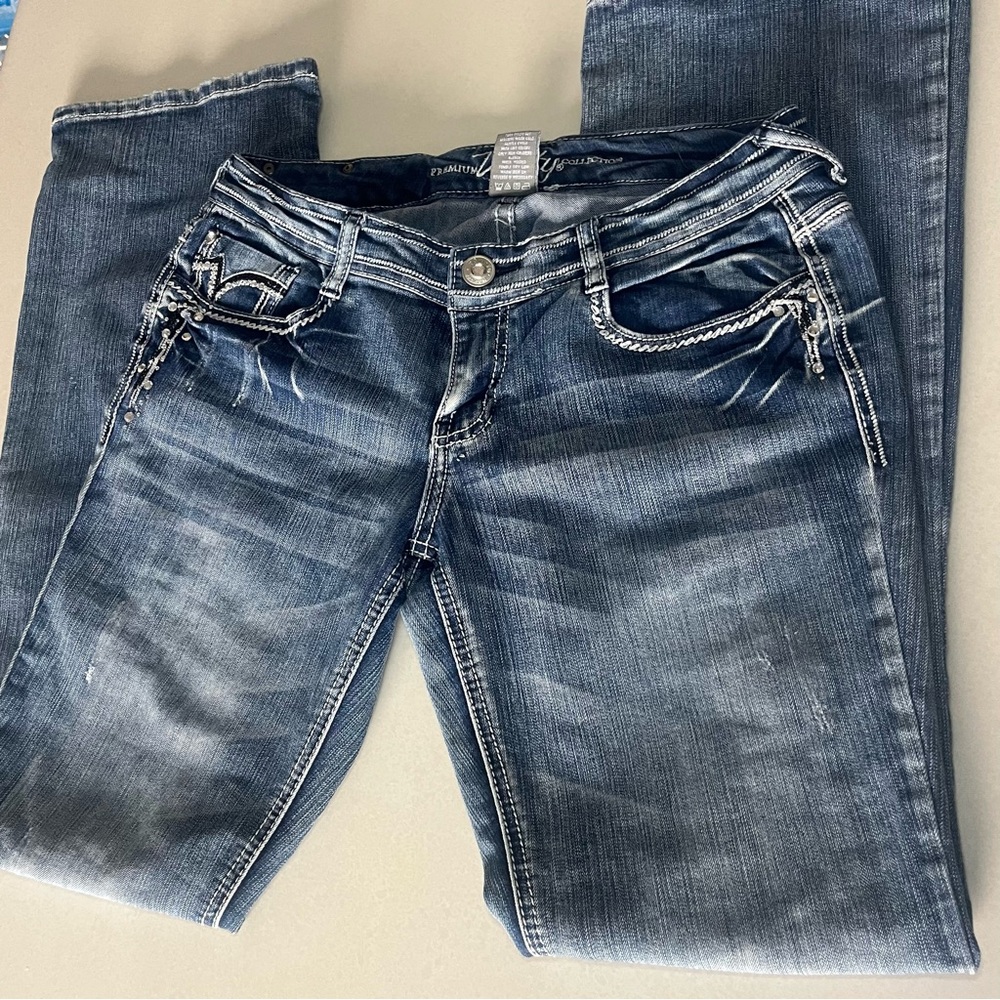Vanity Blue Boot Cut Jeans with Vintage Distressing